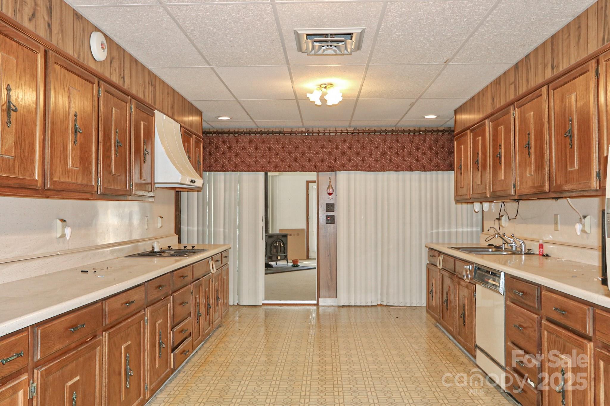 5313 Friendship Circle Road East Bend, NC 27018 - Photo 10 of 48 a kitchen with a sink stove and cabinets