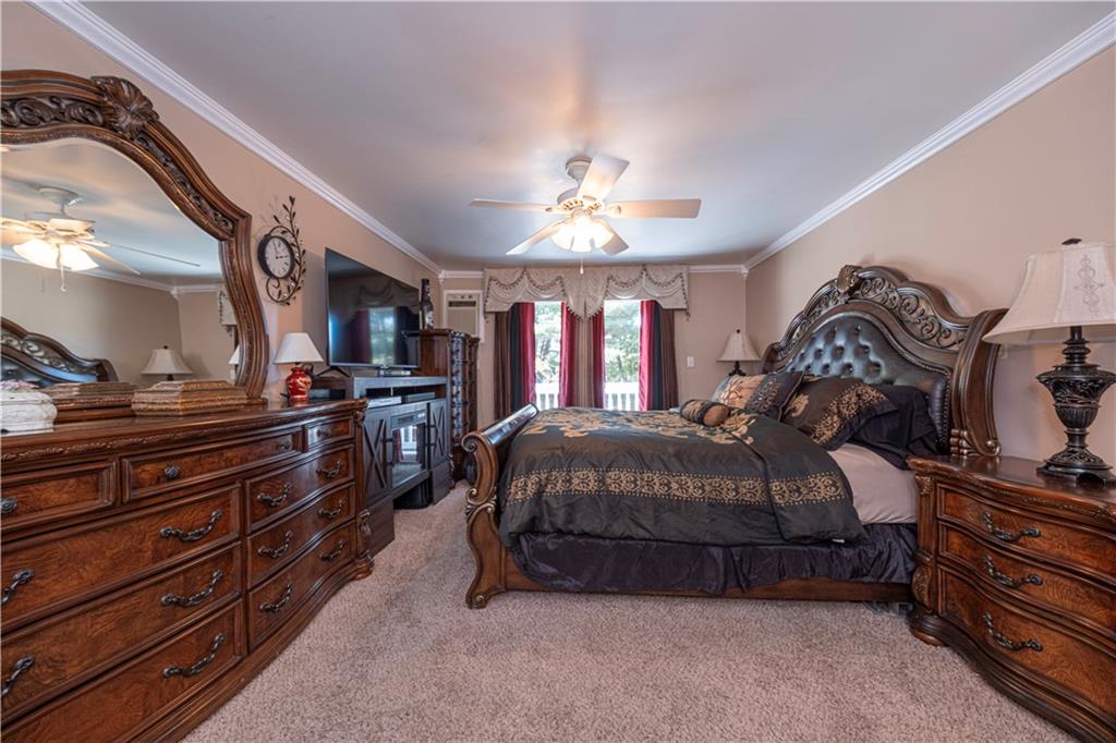 2174 Ramsey Road Monroeville, PA 15146 - Photo 22 of 44 a spacious bedroom with a bed and ceiling fan