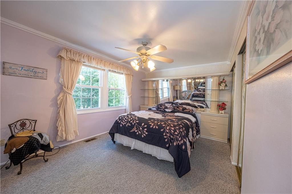 2174 Ramsey Road Monroeville, PA 15146 - Photo 30 of 44 a bed sitting in a room next to a window