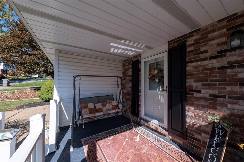 2174 Ramsey Road Monroeville, PA 15146 - Photo 4 of 44 a living room with furniture oven and a fireplace