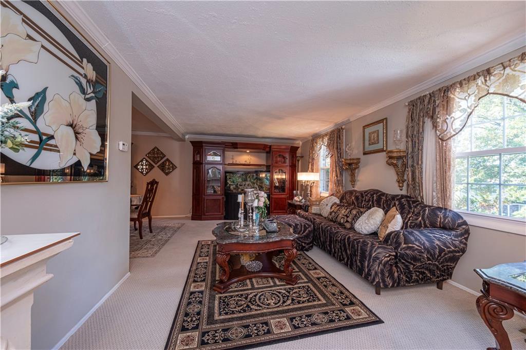 2174 Ramsey Road Monroeville, PA 15146 - Photo 7 of 44 a living room with furniture and a rug
