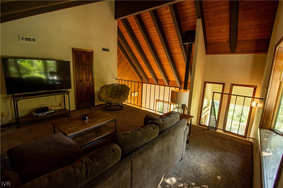 908 Harold Drive, Unit 23 Incline Village, NV 89451 - Photo 11 of 14 a living room with furniture and a flat screen tv