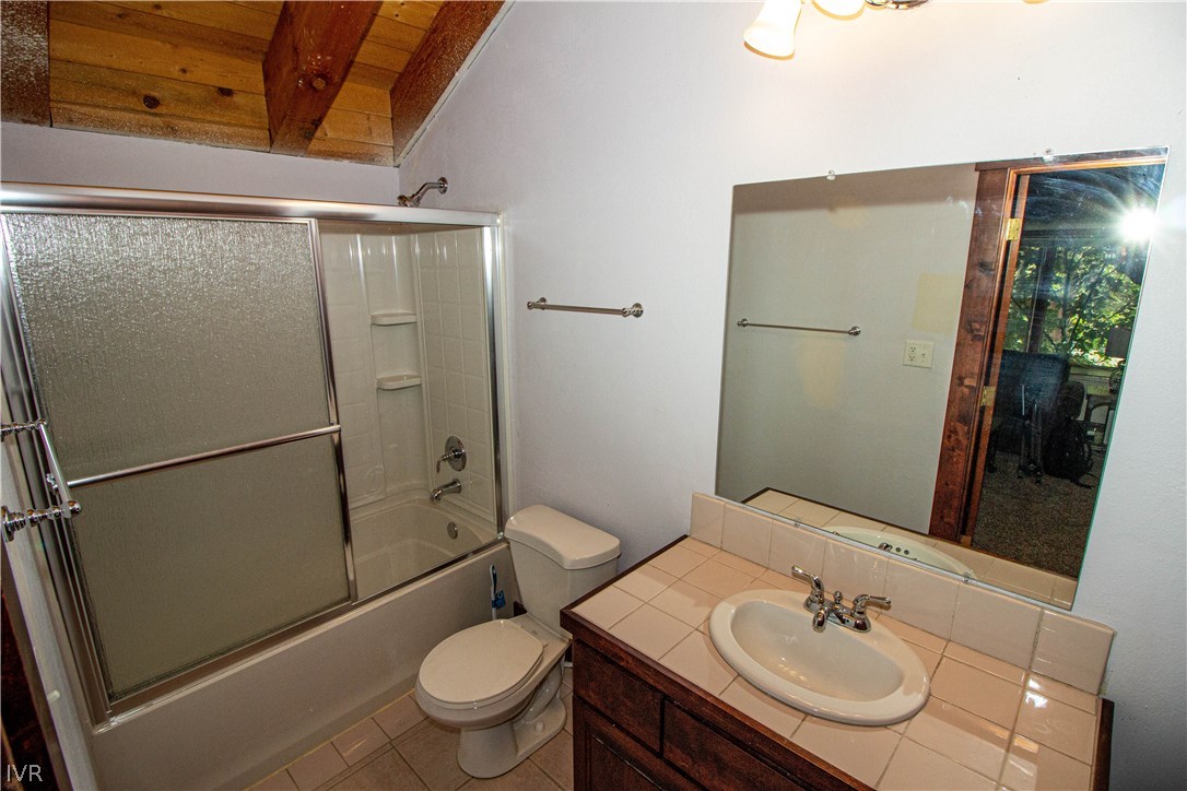 908 Harold Drive, Unit 23 Incline Village, NV 89451 - Photo 12 of 14 a bathroom with a sink toilet and shower