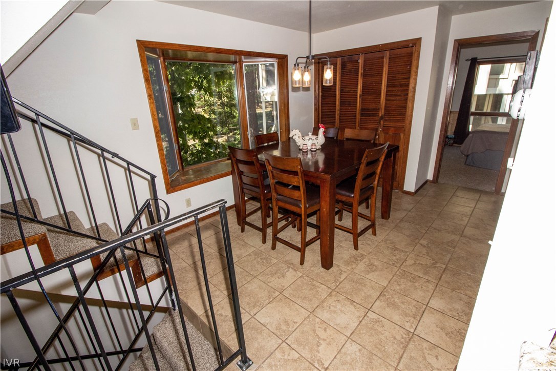 908 Harold Drive, Unit 23 Incline Village, NV 89451 - Photo 3 of 14 a view of a dining room with furniture window and outside view