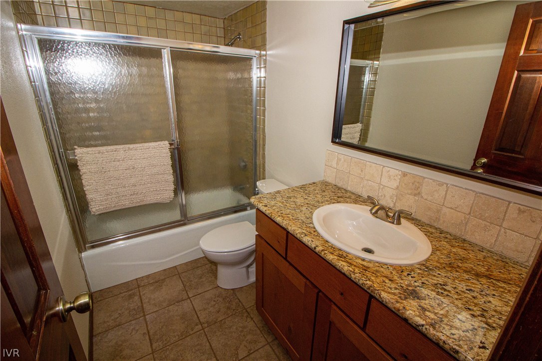 908 Harold Drive, Unit 23 Incline Village, NV 89451 - Photo 7 of 14 a bathroom with a sink a toilet and shower