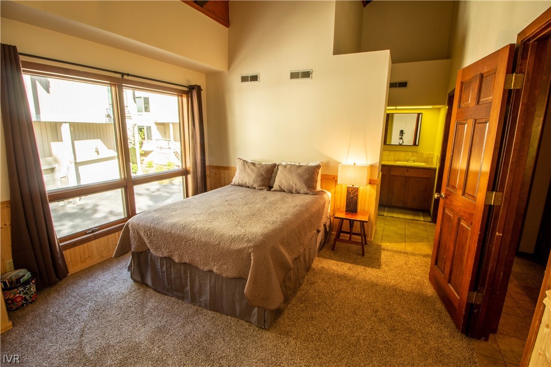 908 Harold Drive, Unit 23 Incline Village, NV 89451 - Photo 8 of 14 a bedroom with a bed and a window