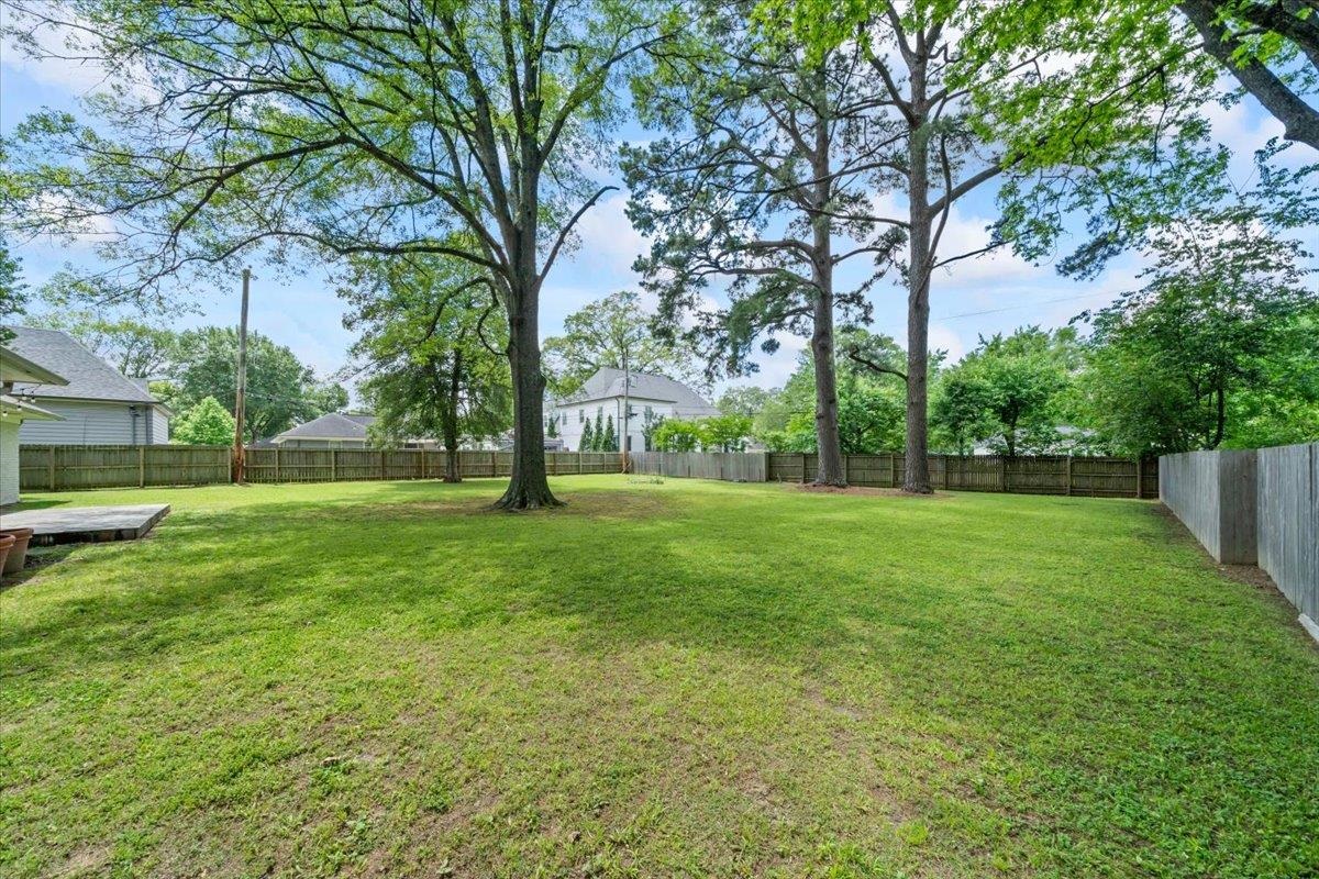401 Avon Road Memphis, TN 38117 - Photo 25 of 27 a view of grassy field with trees