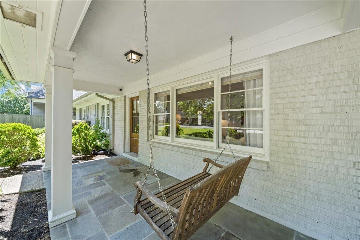 401 Avon Road Memphis, TN 38117 - Photo 7 of 27 a balcony with furniture and a potted plant