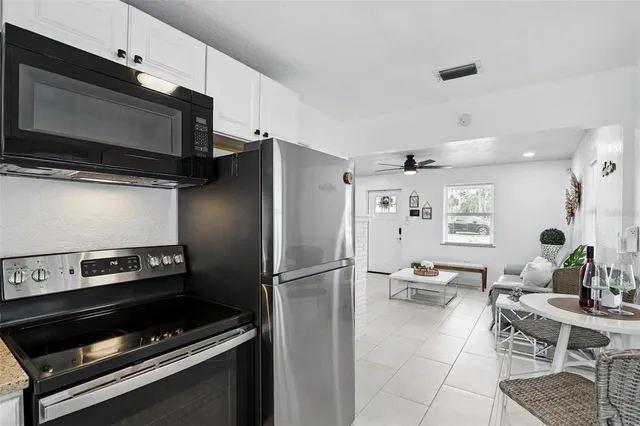 a bedroom with bed and a window
