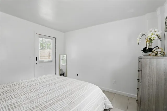 a bathroom with a toilet sink and shower