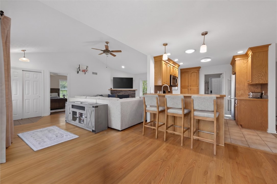 663 Hosmer Road Churchville, NY 14428 - Photo 25 of 42 Virtual staged photo adding barstools