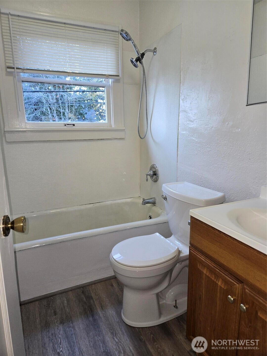 500 Gladstone Street Bellingham, WA 98225 - Photo 6 of 16 a bathroom with a sink a toilet and shower