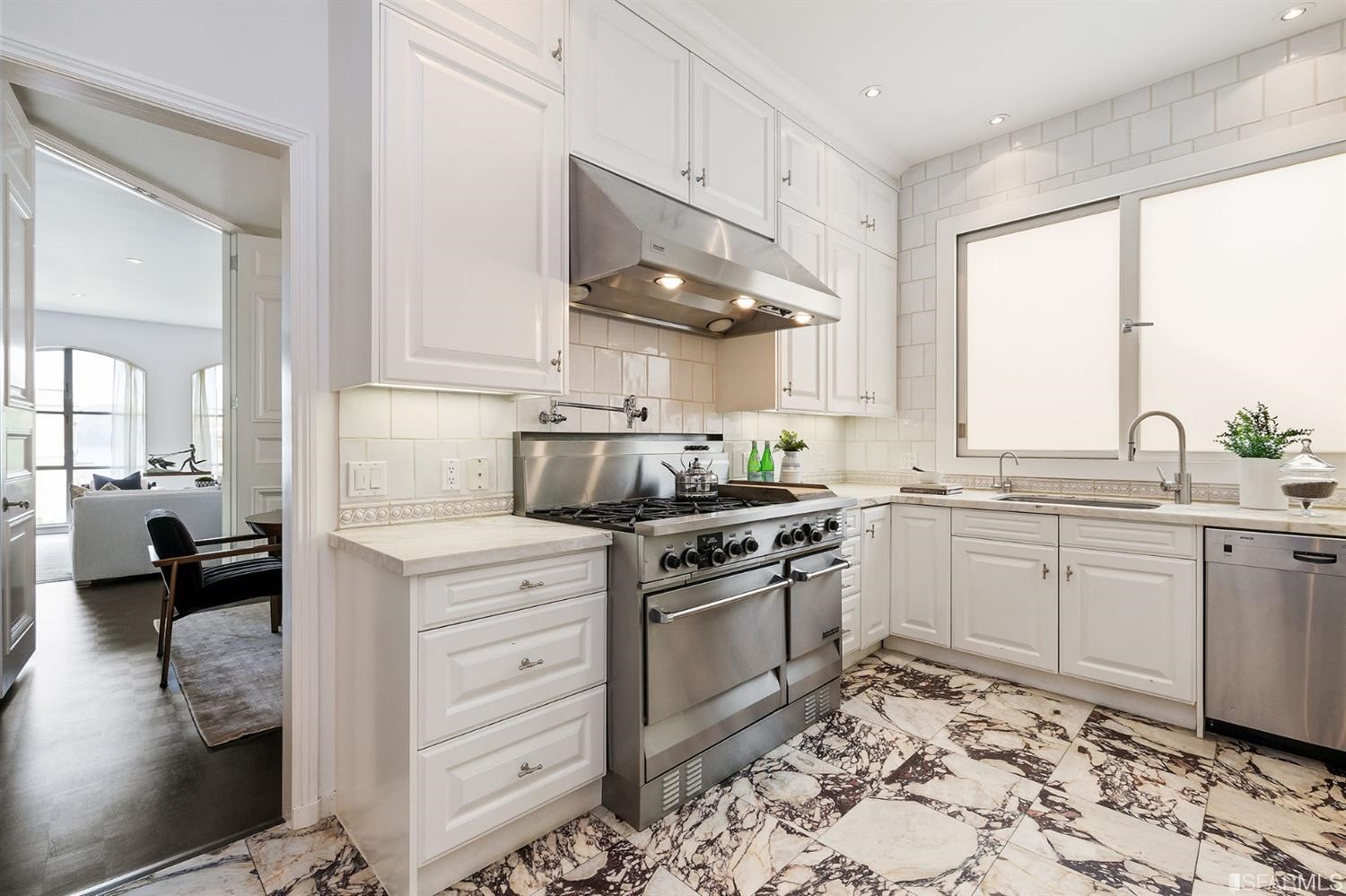 135 Sea Cliff Avenue San Francisco, CA 94121 - Photo 22 of 69 a kitchen with a sink cabinets and window