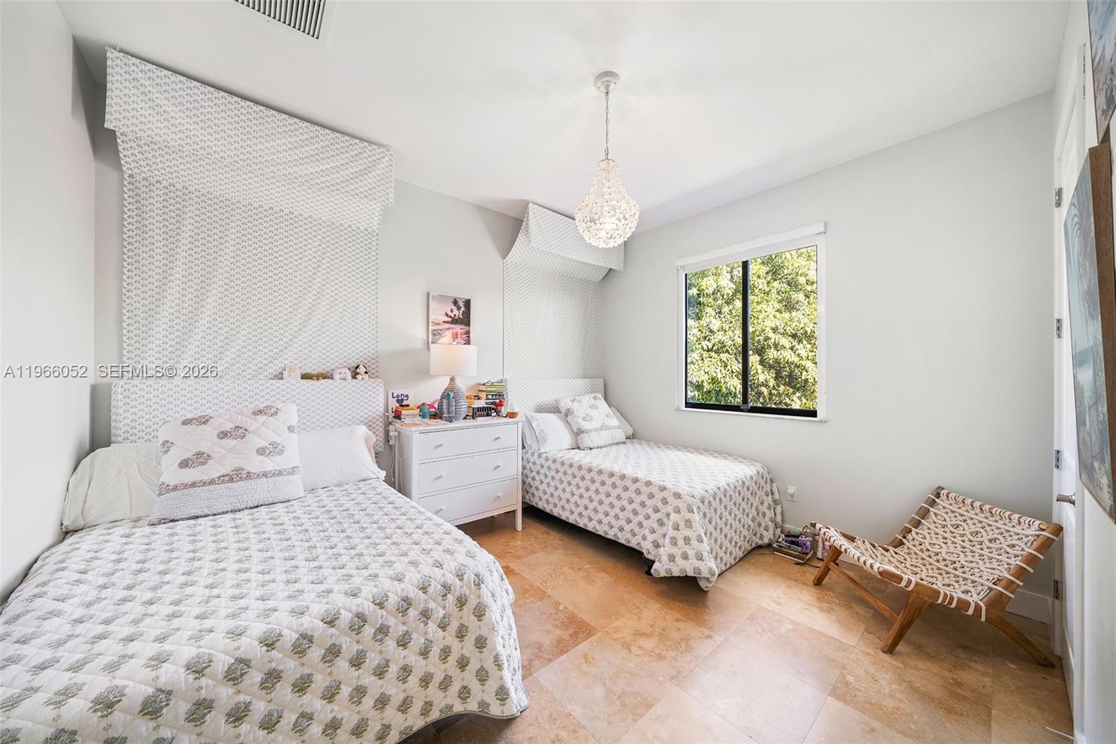 6001 Southwest 28th Street Miami, FL 33155 - Photo 22 of 30 a bedroom with bed and window