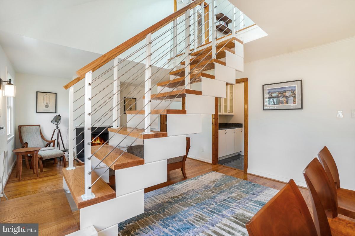 8335 Grubb Road, Unit 203 Silver Spring, MD 20910 - Photo 12 of 29 a living room with furniture