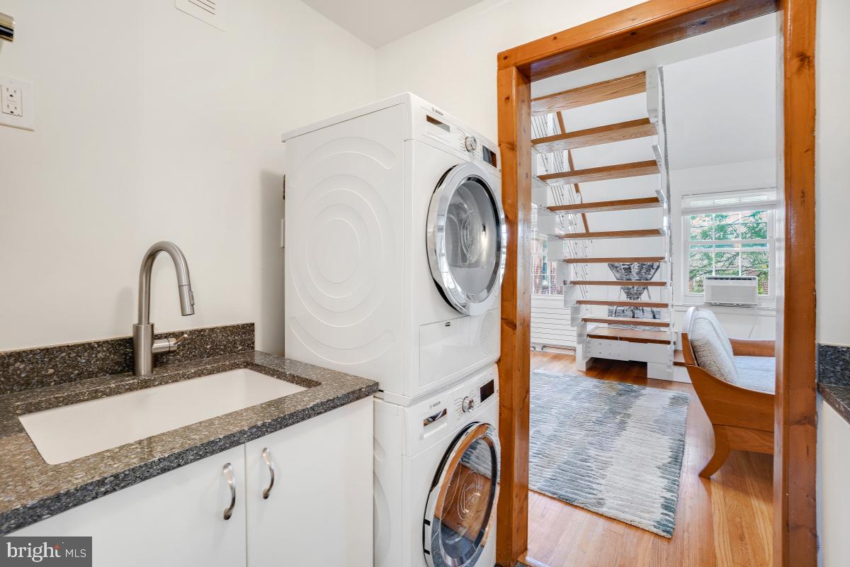 8335 Grubb Road, Unit 203 Silver Spring, MD 20910 - Photo 15 of 29 a bathroom with a sink and a mirror