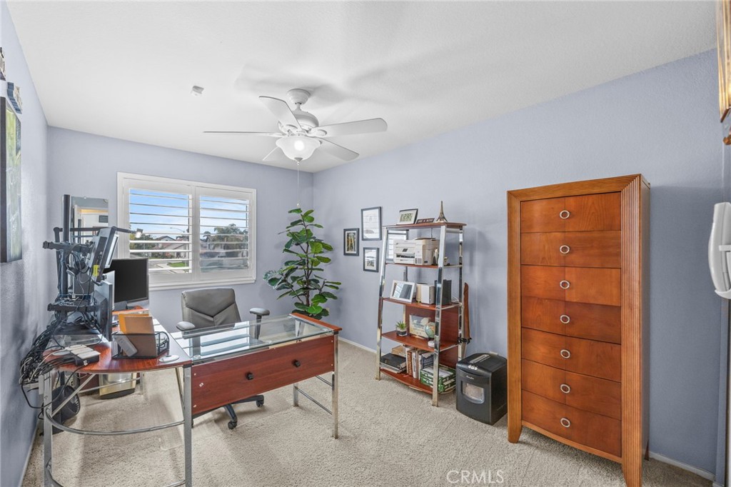 20257 Edmund Road Riverside, CA 92508 - Photo 33 of 53 a living room with furniture and a chandelier