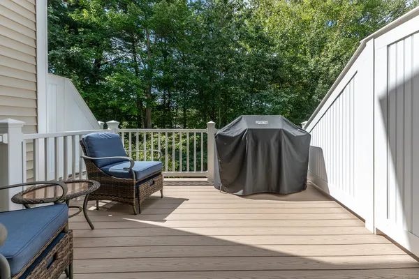 a view of sitting area with furniture in backyard