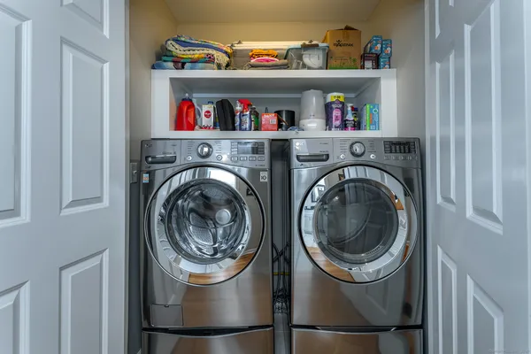 a storage room with washer and dryer