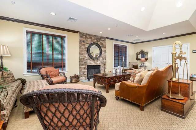 a view of a chairs and table in the balcony
