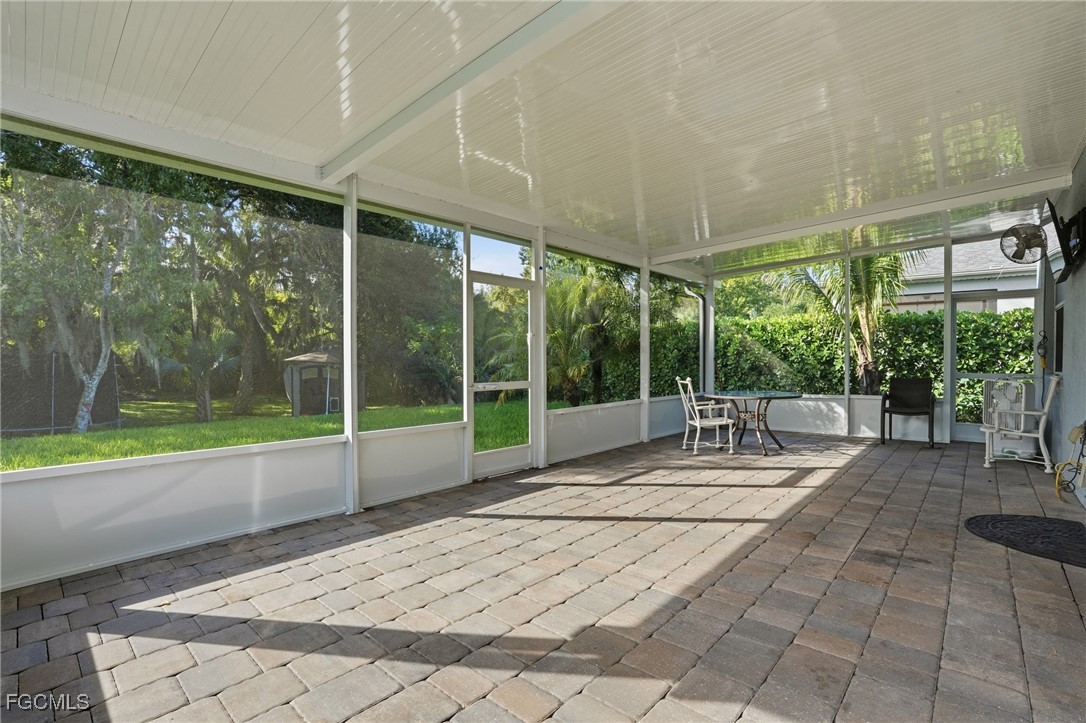 1004 Hamilton Street Immokalee, FL 34142 - Photo 36 of 45 a house with yard and outdoor seating