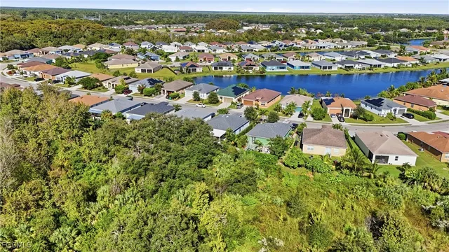 an aerial view of a house with a garden