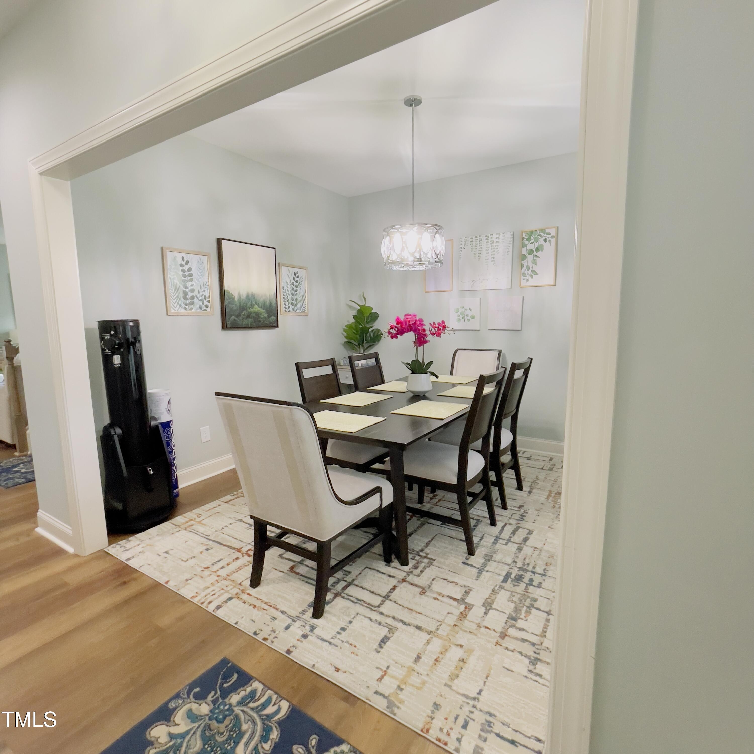136 Unique Place Garner, NC 27529 - Photo 6 of 21 a dining room with furniture and window