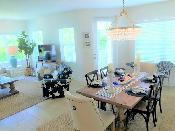 a view of a workspace and dining room