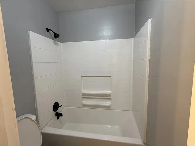 a bathroom with a bathtub