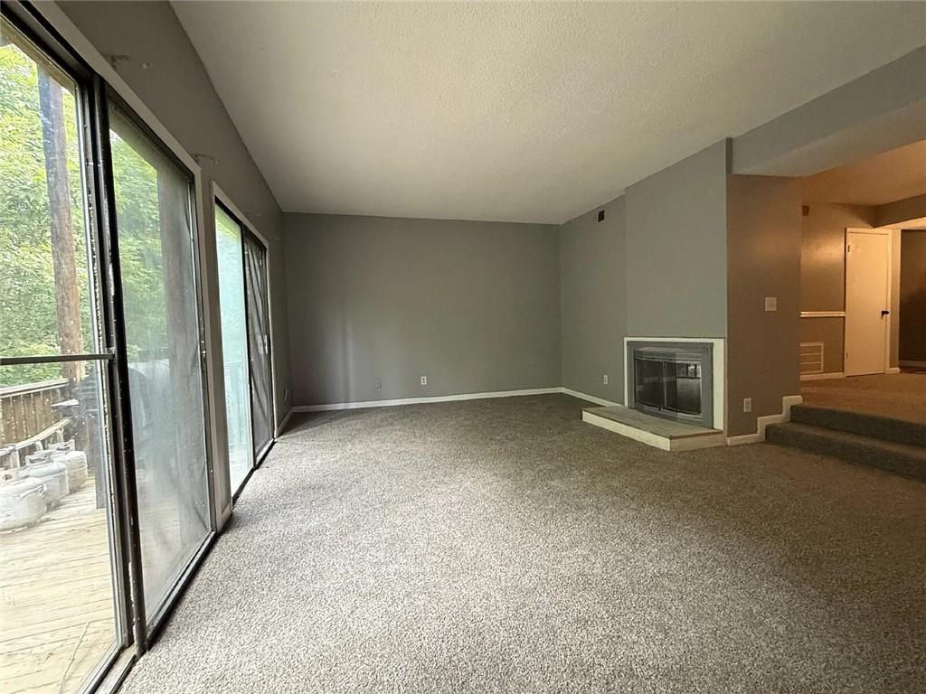 20 Quail Run Decatur, GA 30035 - Photo 3 of 15 en empty room with windows