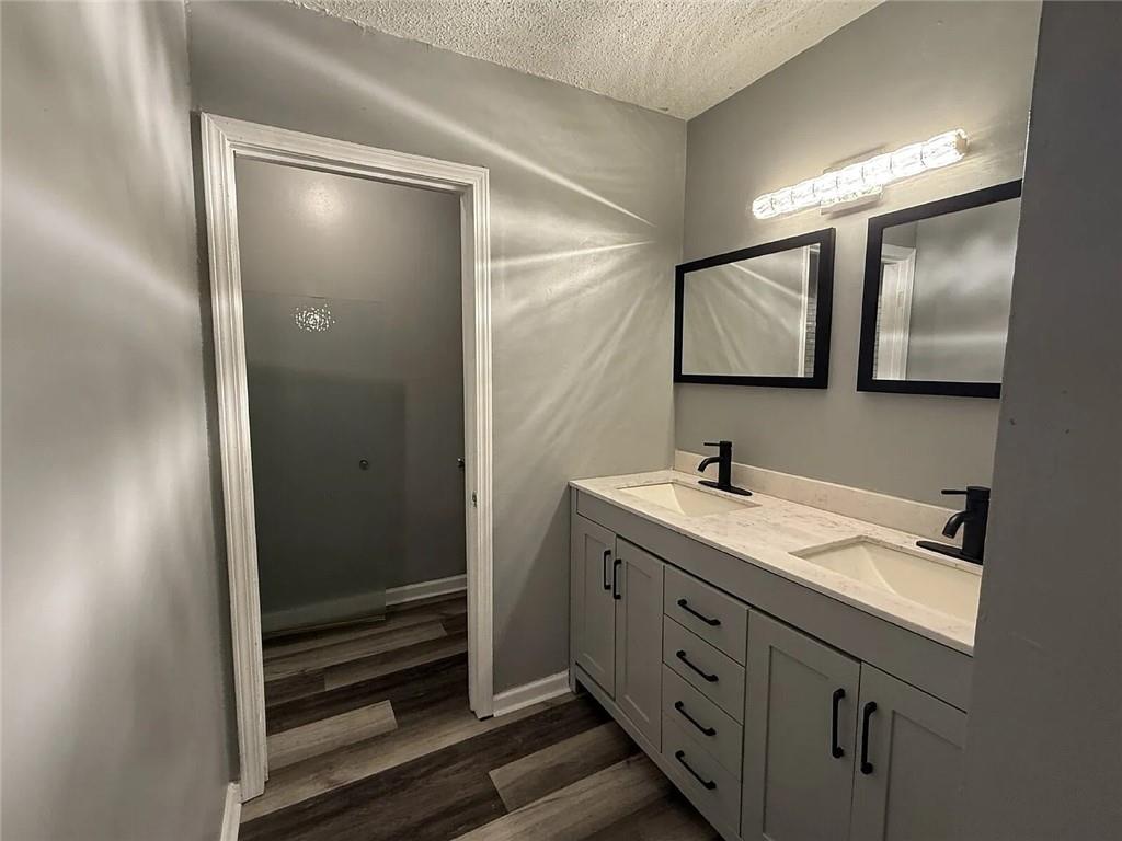 20 Quail Run Decatur, GA 30035 - Photo 9 of 15 a bathroom with a double vanity sink mirror and