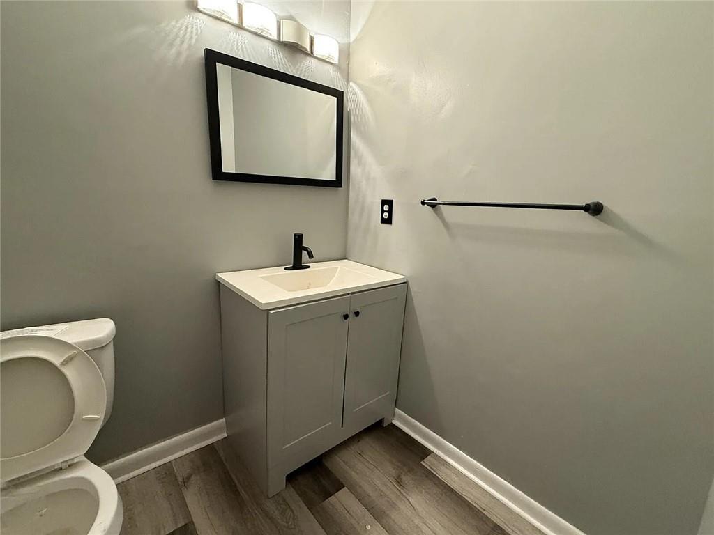 20 Quail Run Decatur, GA 30035 - Photo 10 of 15 a bathroom with a toilet sink and vanity