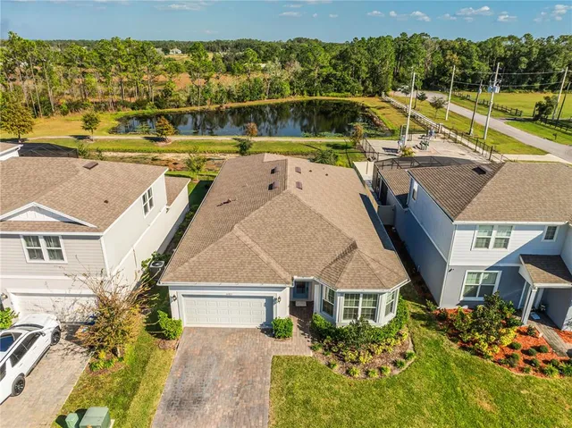 a aerial view of a house with a swimming pool