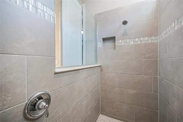 a bathroom with a sink and a shower