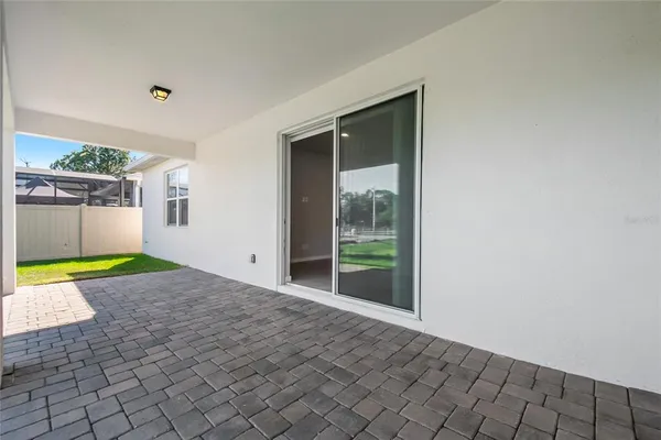 a view of a backyard of a house