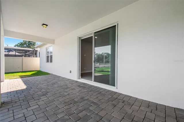 a view of a backyard of a house