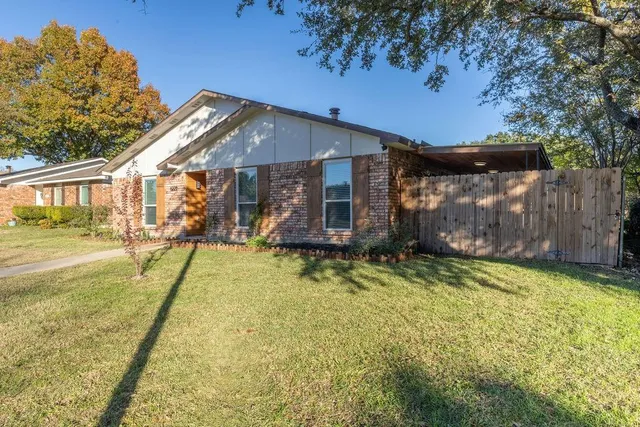 a view of swimming pool with a backyard