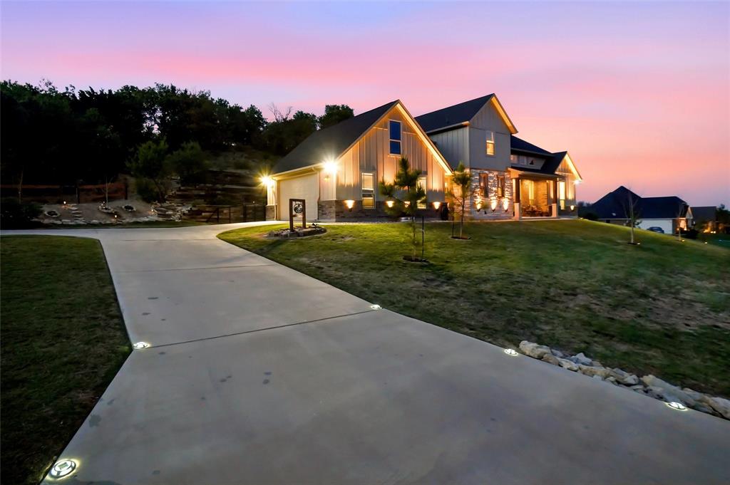 1024 Tex Lane Springtown, TX 76082 - Photo 4 of 40 a view of house and outdoor space