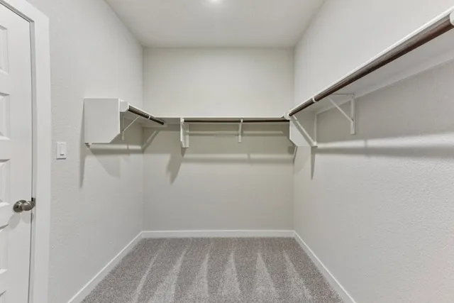a view of a livingroom with a ceiling fan