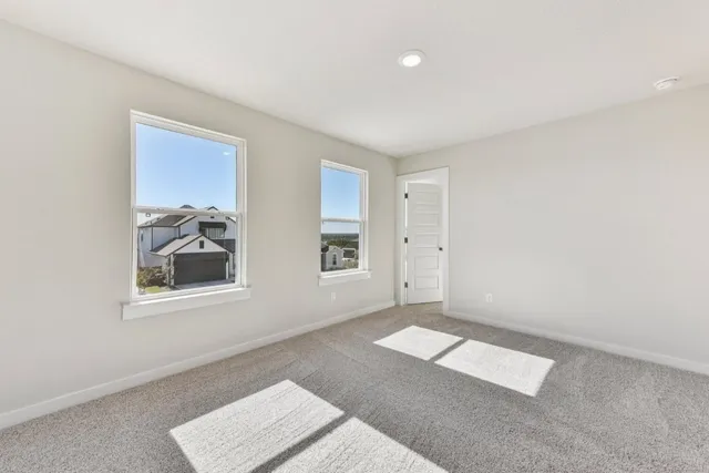 a bathroom with a double vanity sink toilet a shower and a mirror