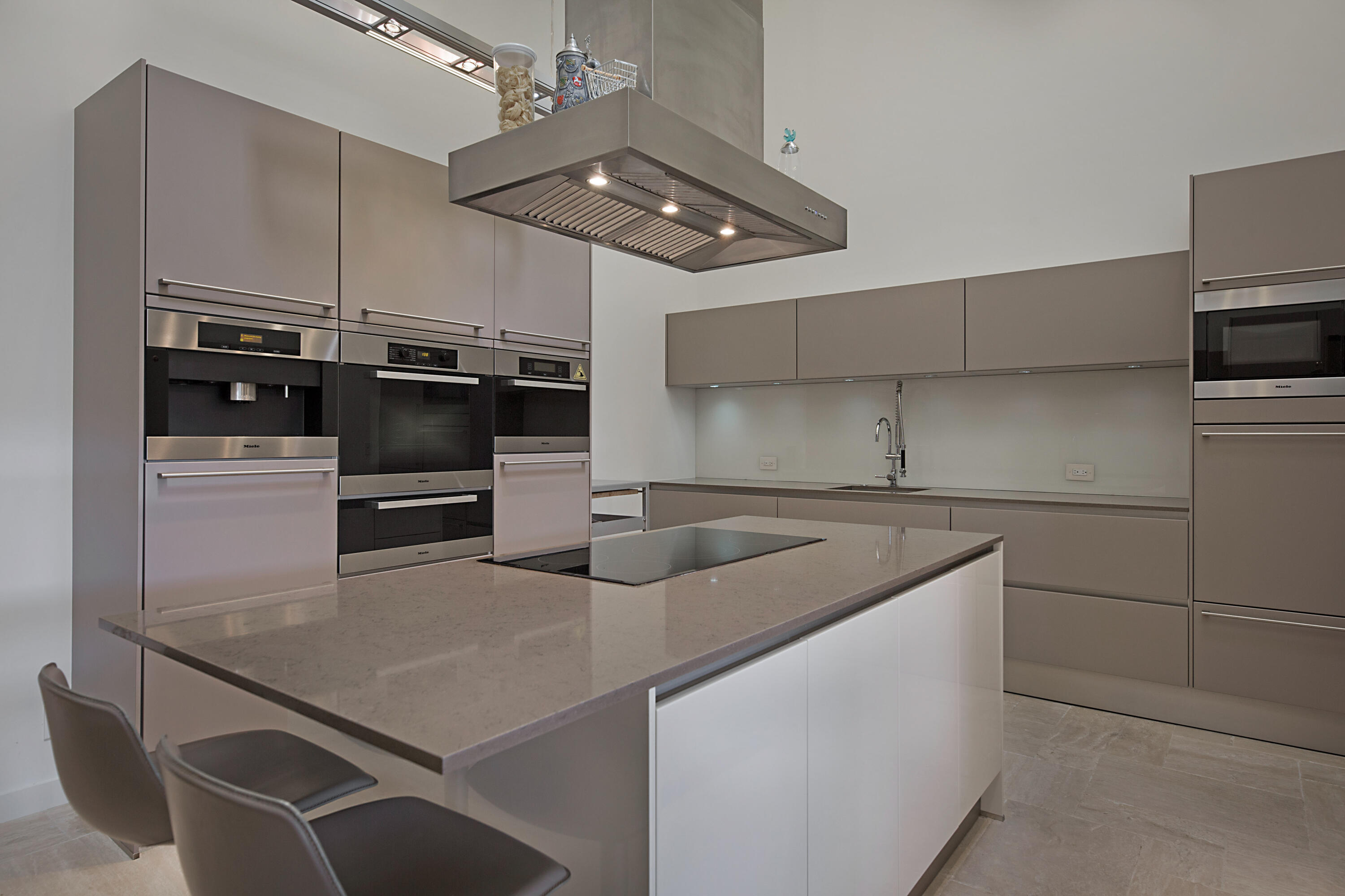 7316 Mandarin Drive Boca Raton, FL 33433 - Photo 16 of 45 a kitchen with stainless steel appliances granite countertop a sink and a refrigerator