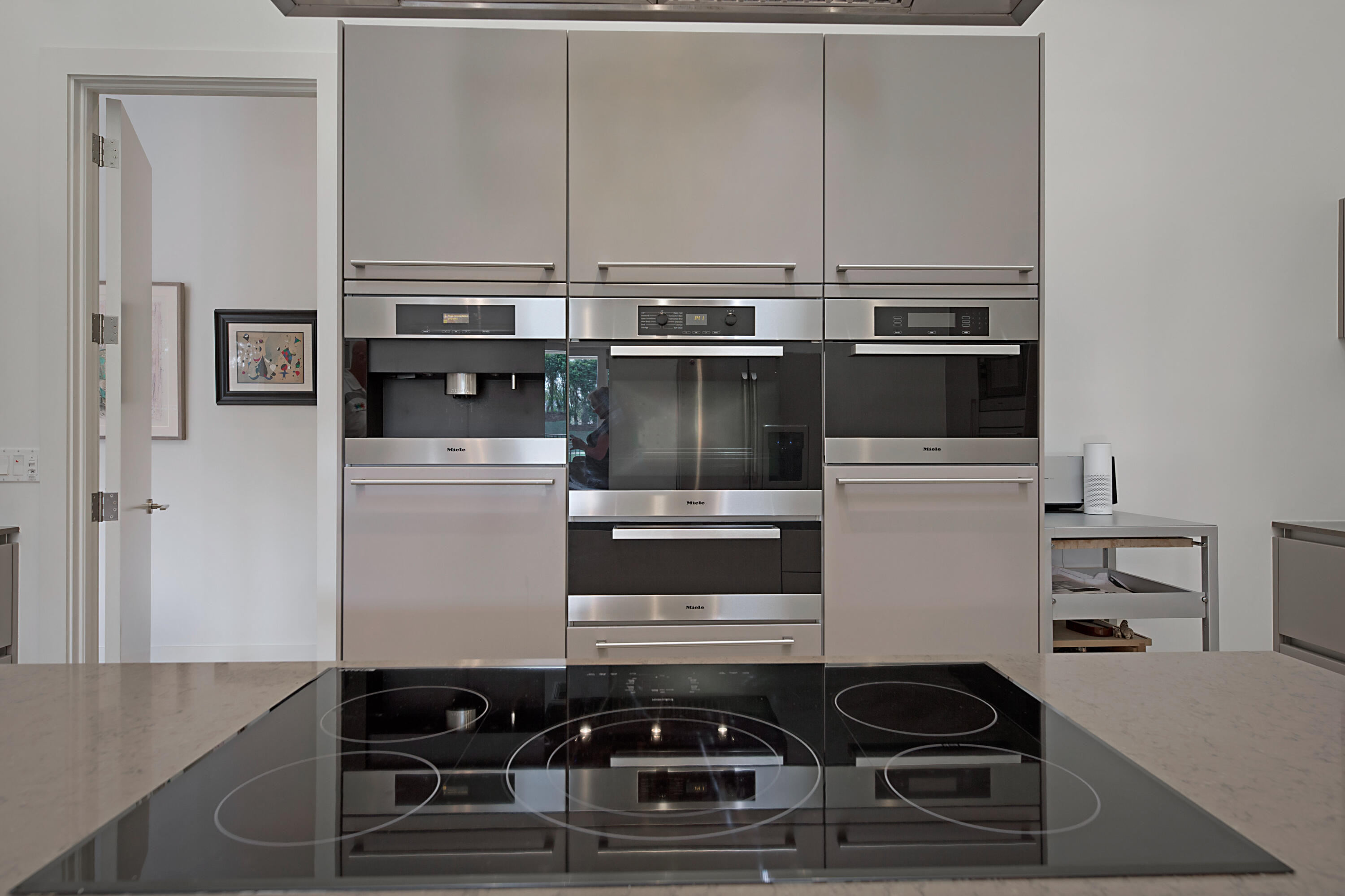 7316 Mandarin Drive Boca Raton, FL 33433 - Photo 17 of 45 a kitchen with a stove and a refrigerator