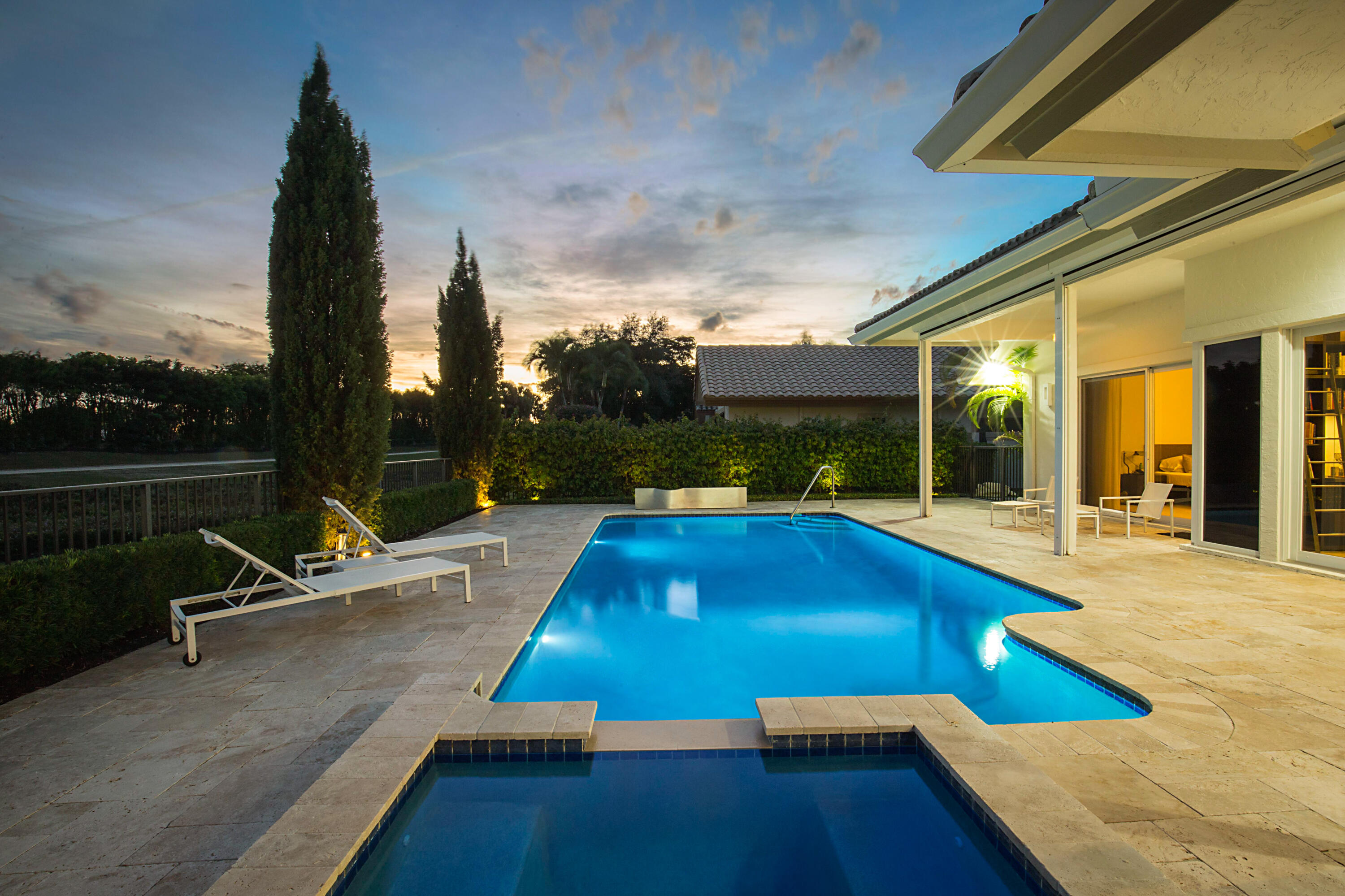 7316 Mandarin Drive Boca Raton, FL 33433 - Photo 32 of 45 a view of a patio with swimming pool table and chairs