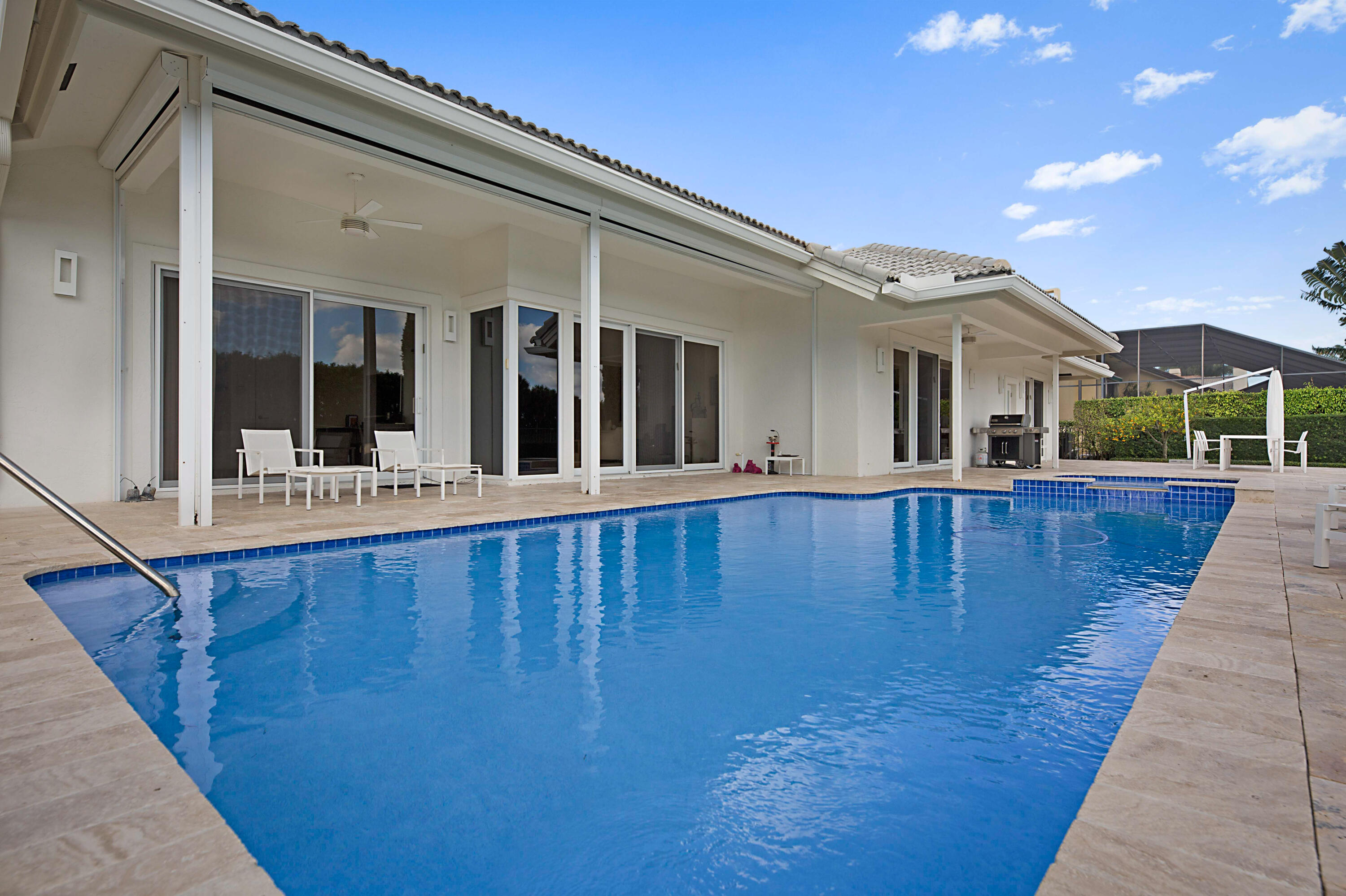 7316 Mandarin Drive Boca Raton, FL 33433 - Photo 33 of 45 a view of swimming pool with outdoor seating