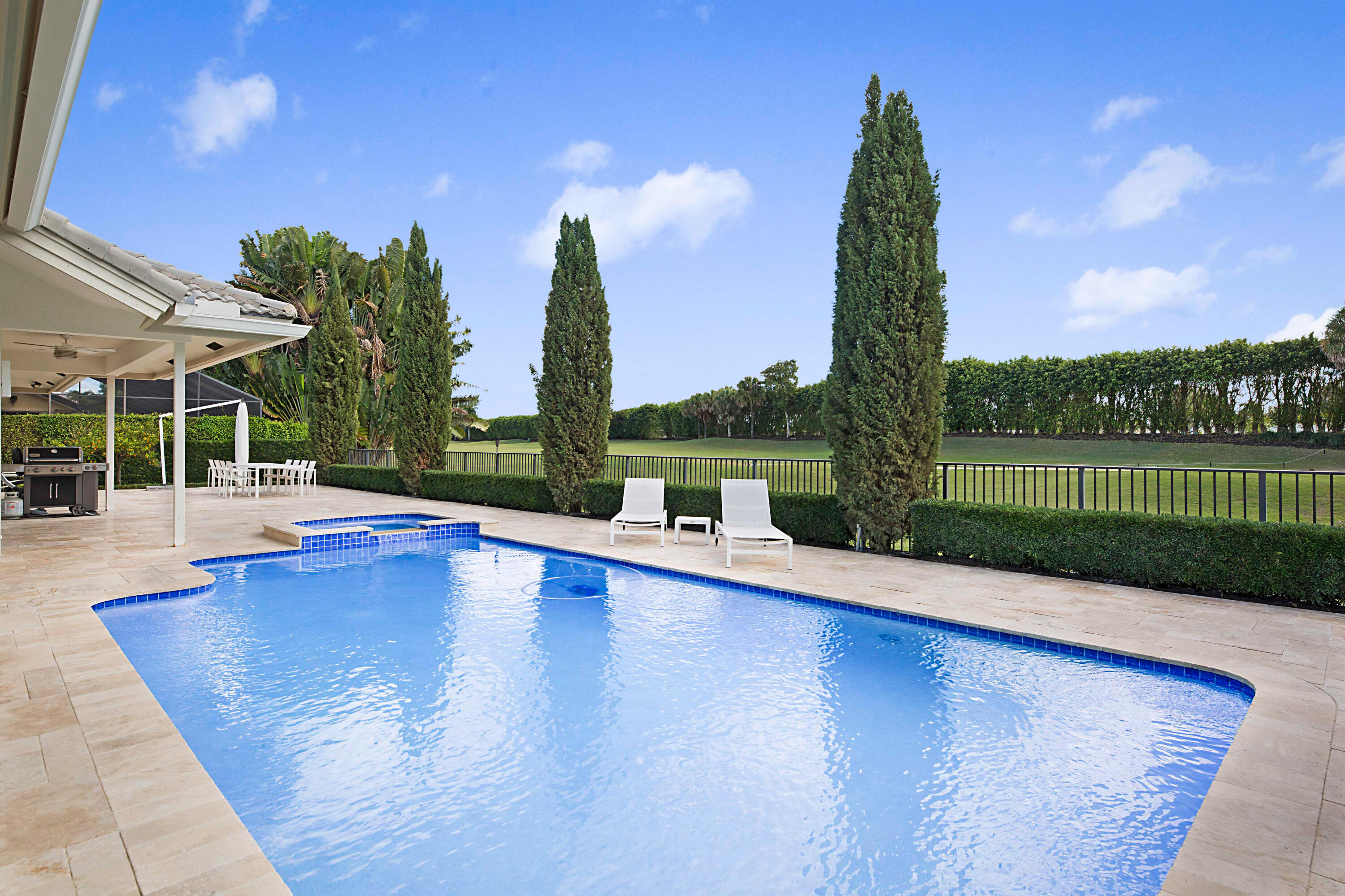 7316 Mandarin Drive Boca Raton, FL 33433 - Photo 36 of 45 a view of outdoor space with swimming pool and yard