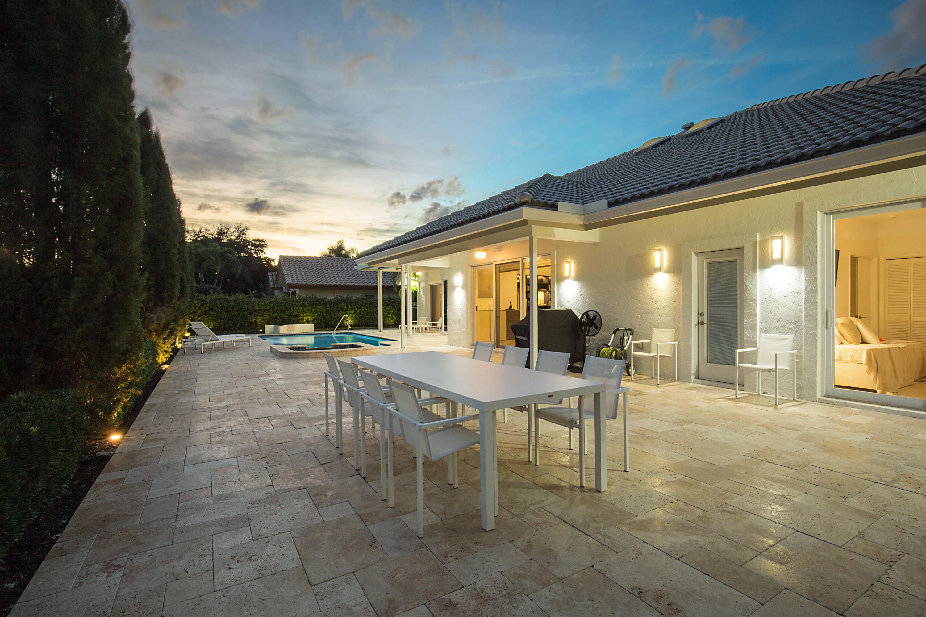 7316 Mandarin Drive Boca Raton, FL 33433 - Photo 39 of 45 a swimming pool with outdoor seating and yard