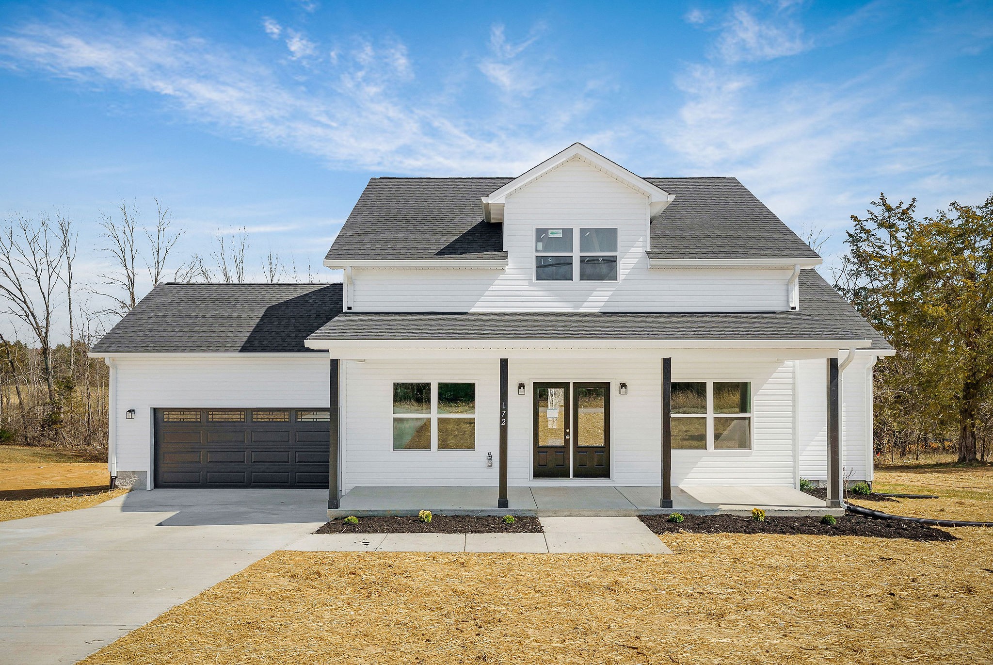 172 Johnson Chapel Road Sparta, TN 38583 - Photo 1 of 38 a front view of a house with a yard