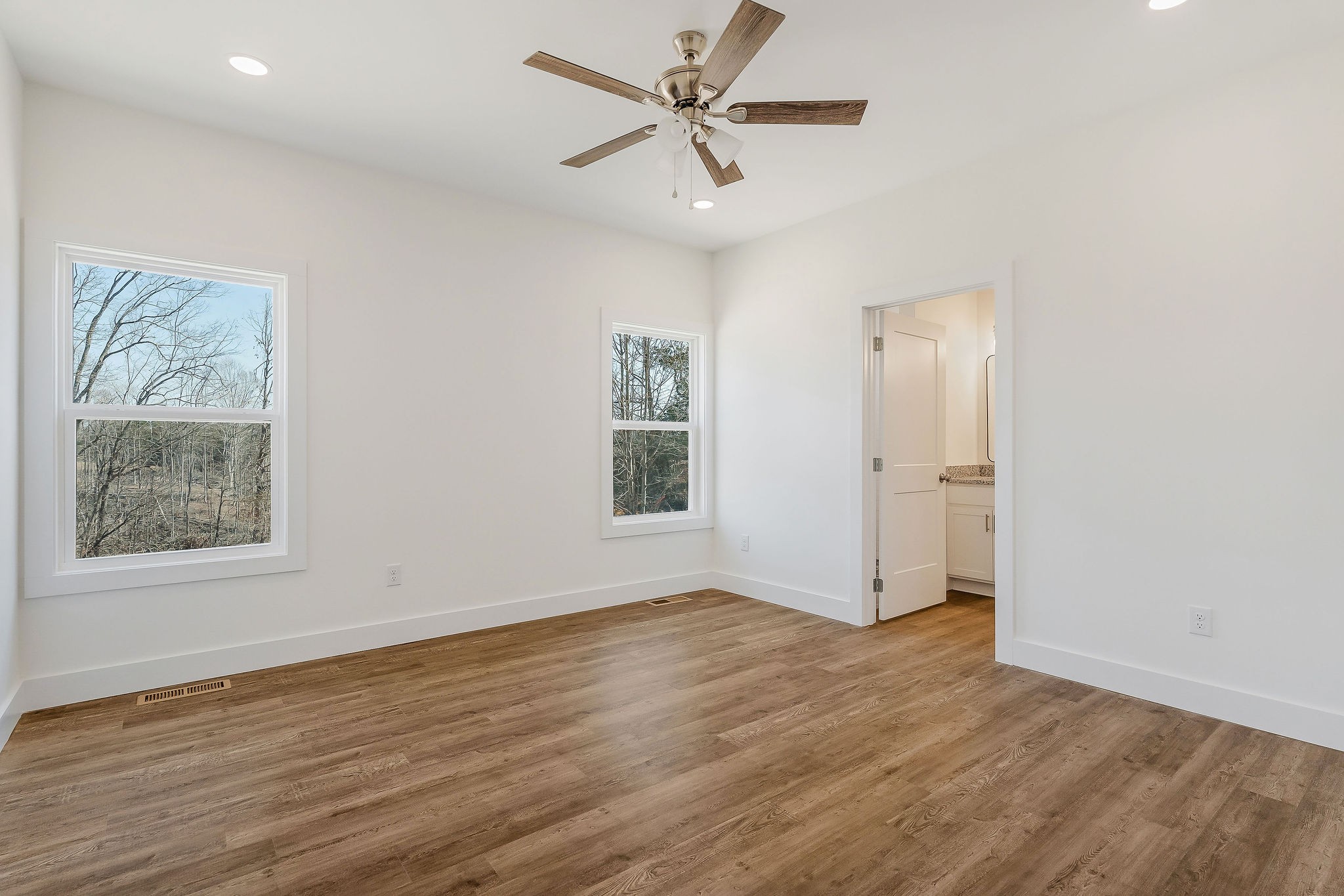 172 Johnson Chapel Road Sparta, TN 38583 - Photo 17 of 38 wooden floor in an empty room with a window