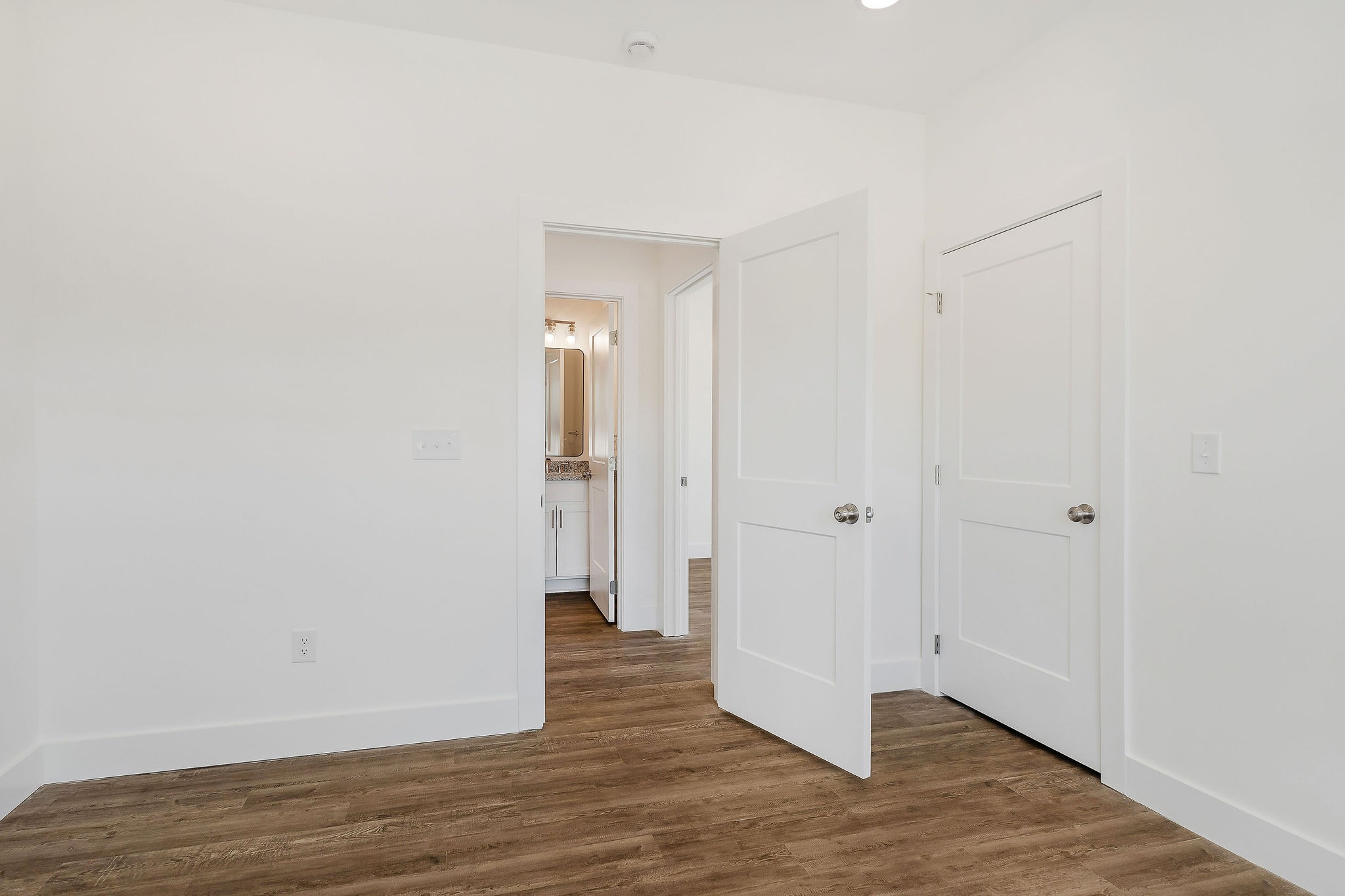 172 Johnson Chapel Road Sparta, TN 38583 - Photo 28 of 38 a view of an empty room with wooden floor and entrance