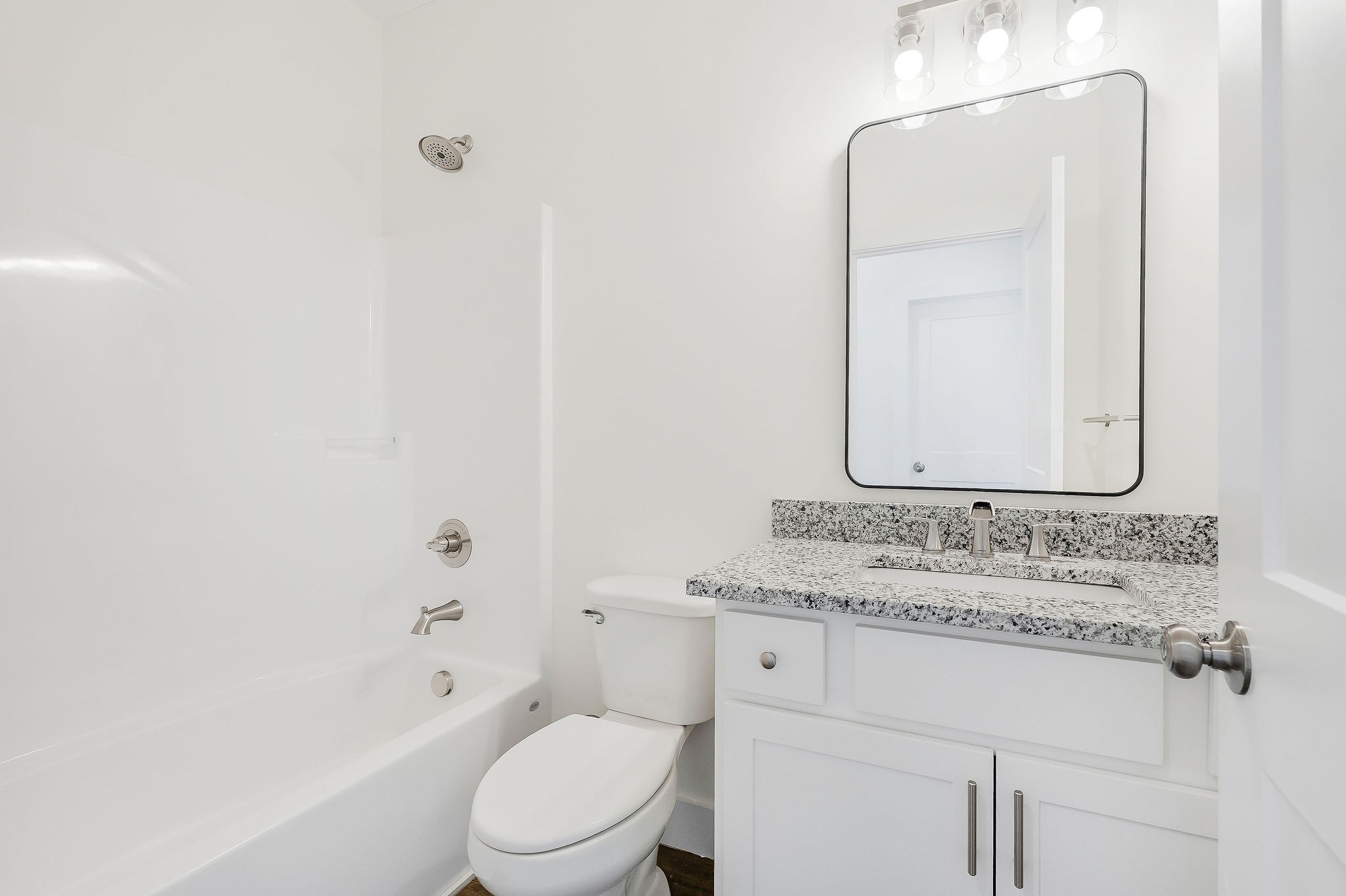 172 Johnson Chapel Road Sparta, TN 38583 - Photo 29 of 38 a bathroom with a granite countertop sink mirror vanity and toilet